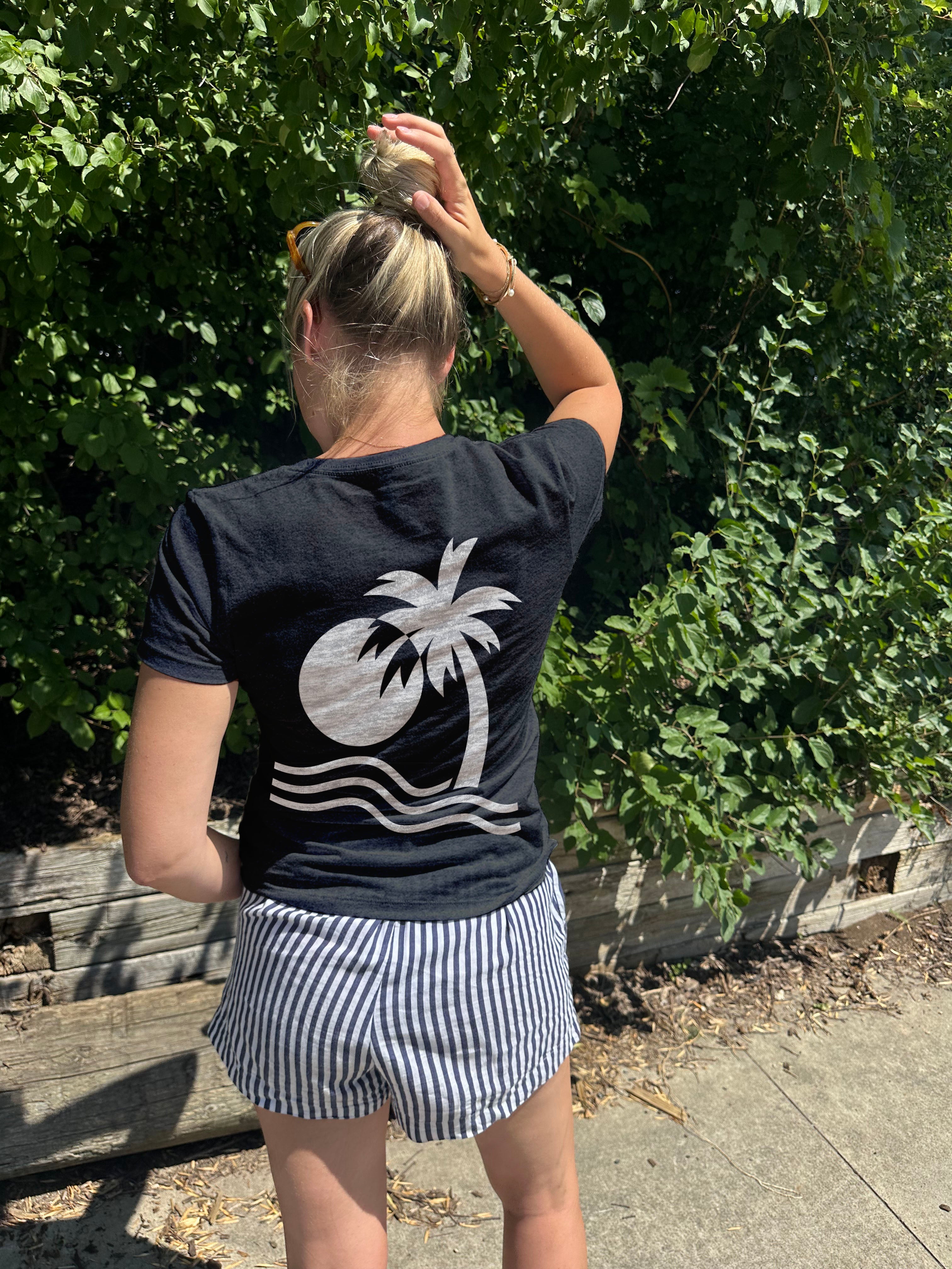 Black tee shirt with a white palm tree graphic