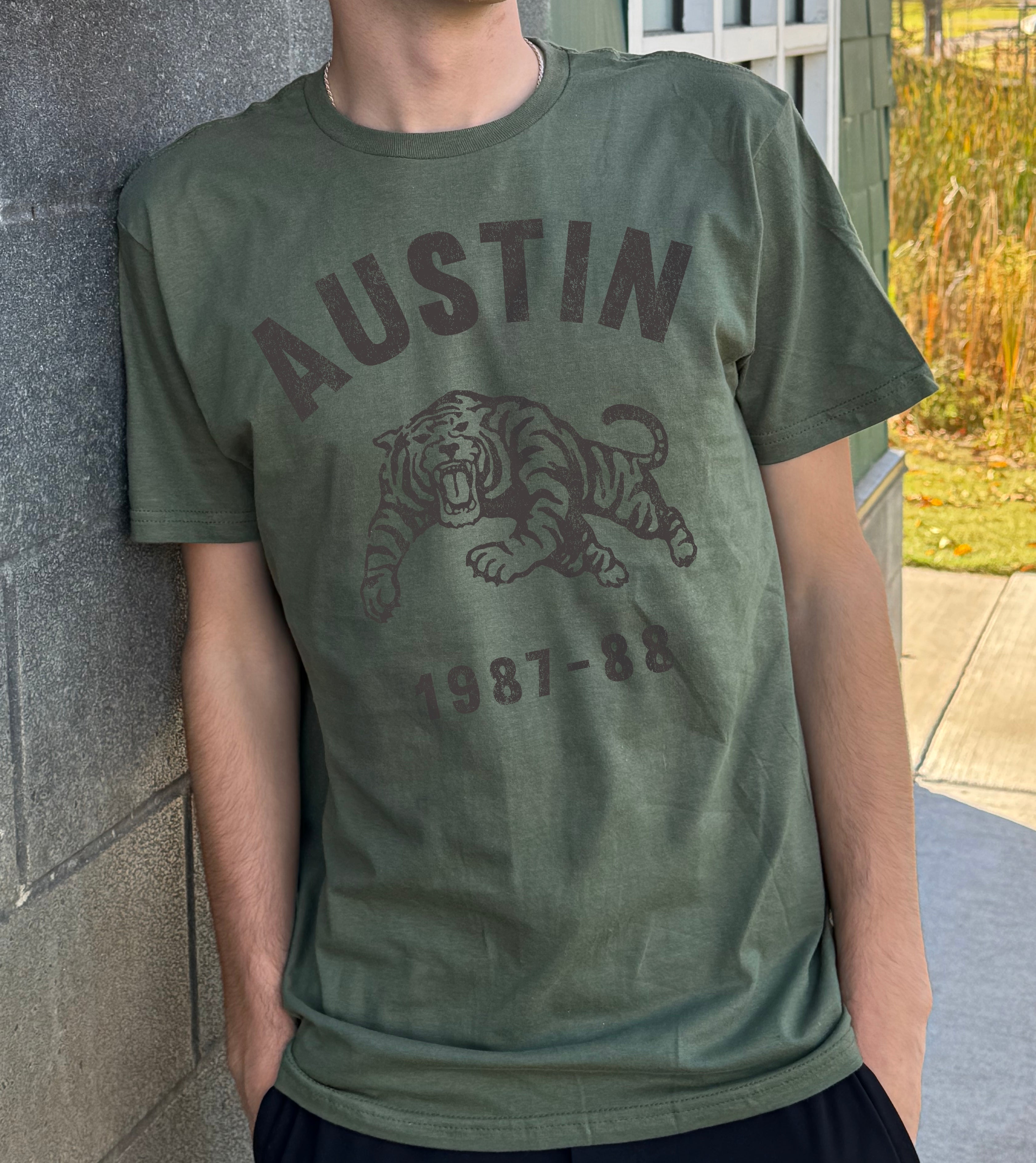 Dark green "Austin 1987-88" Tiger T-shirt with grey text for boys