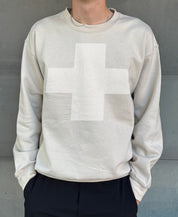 sand colored pullover with a white cross for men