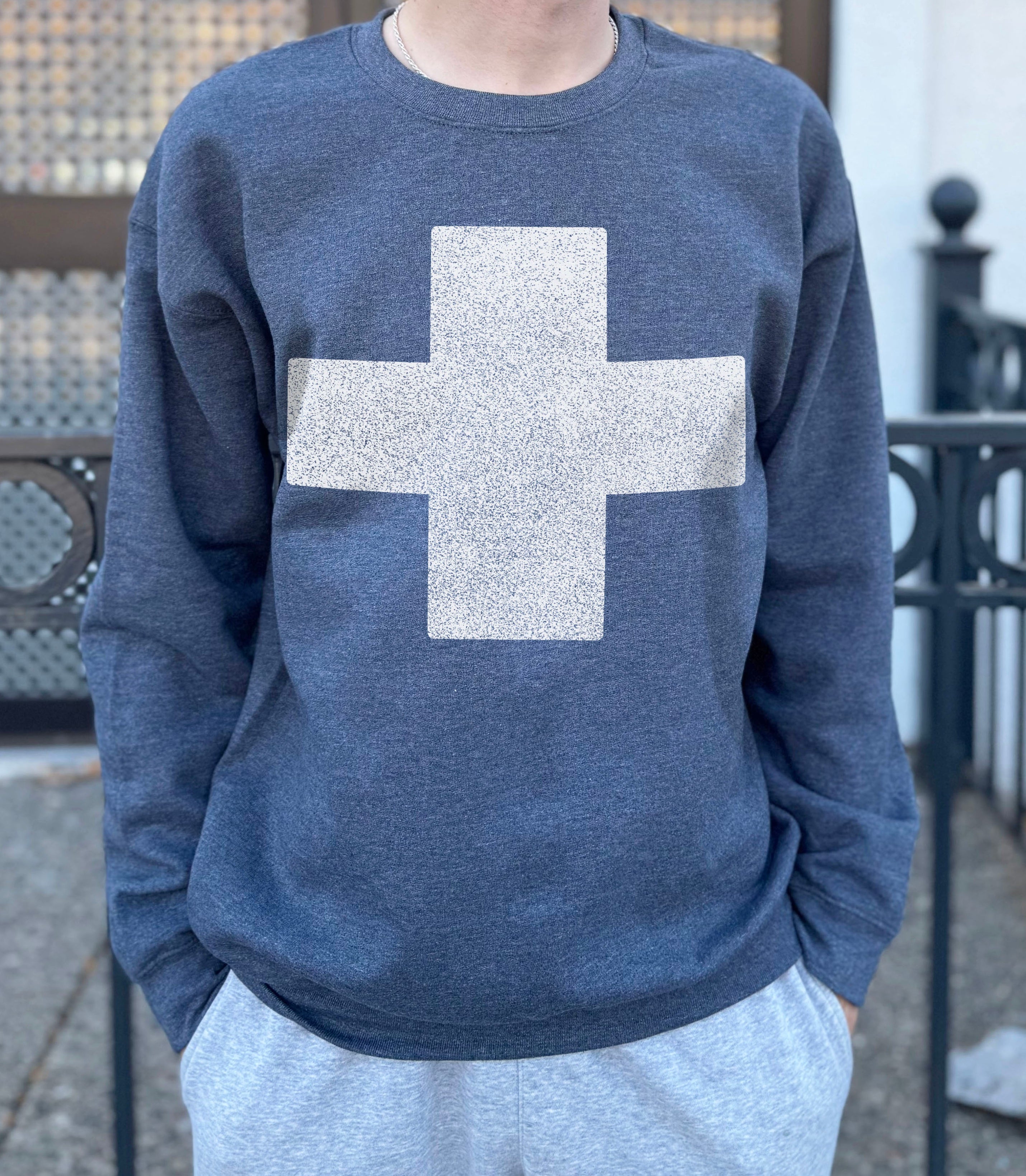 grey pullover with a sand colored cross for men
