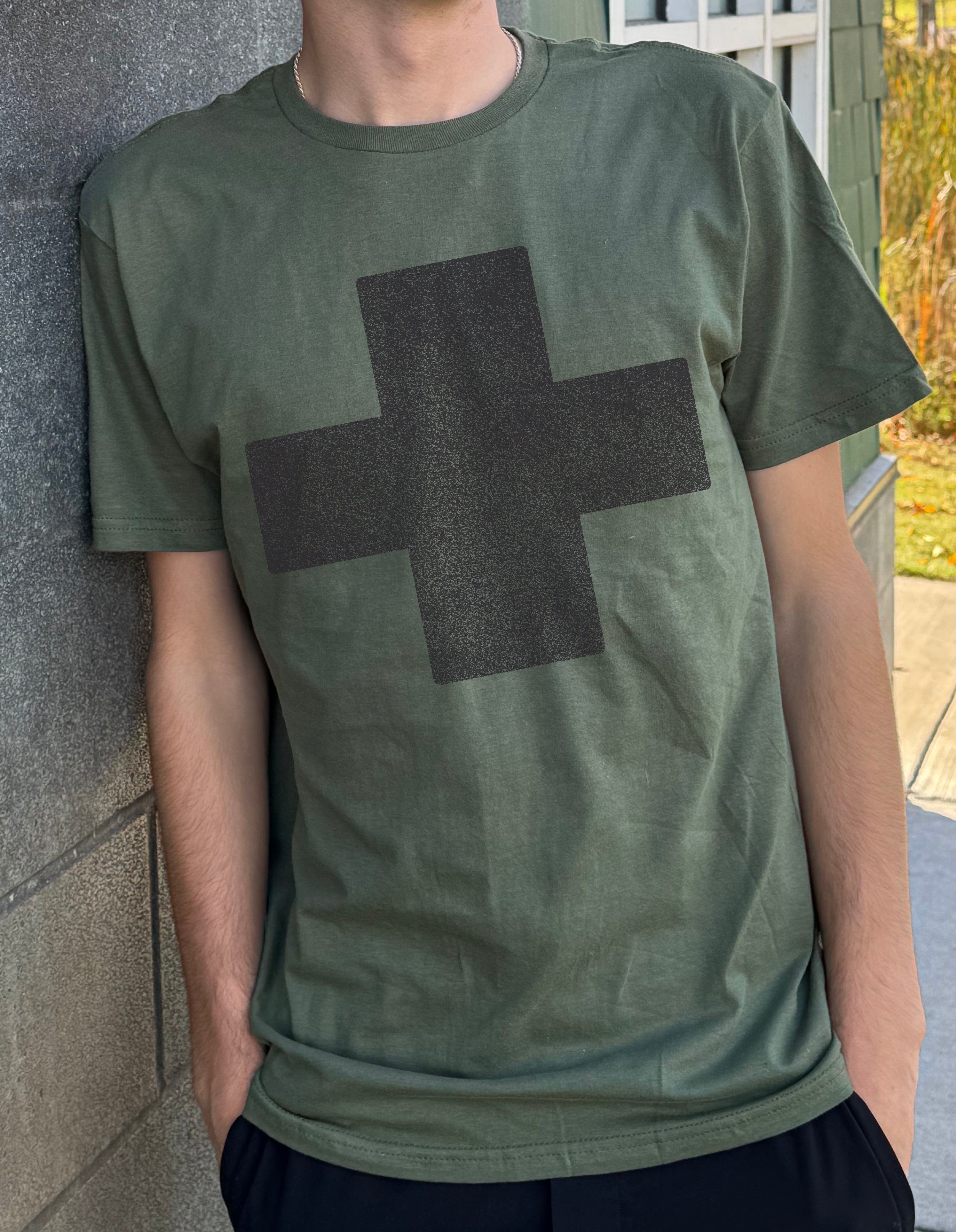 Men's dark green colored T-shirt with black cross