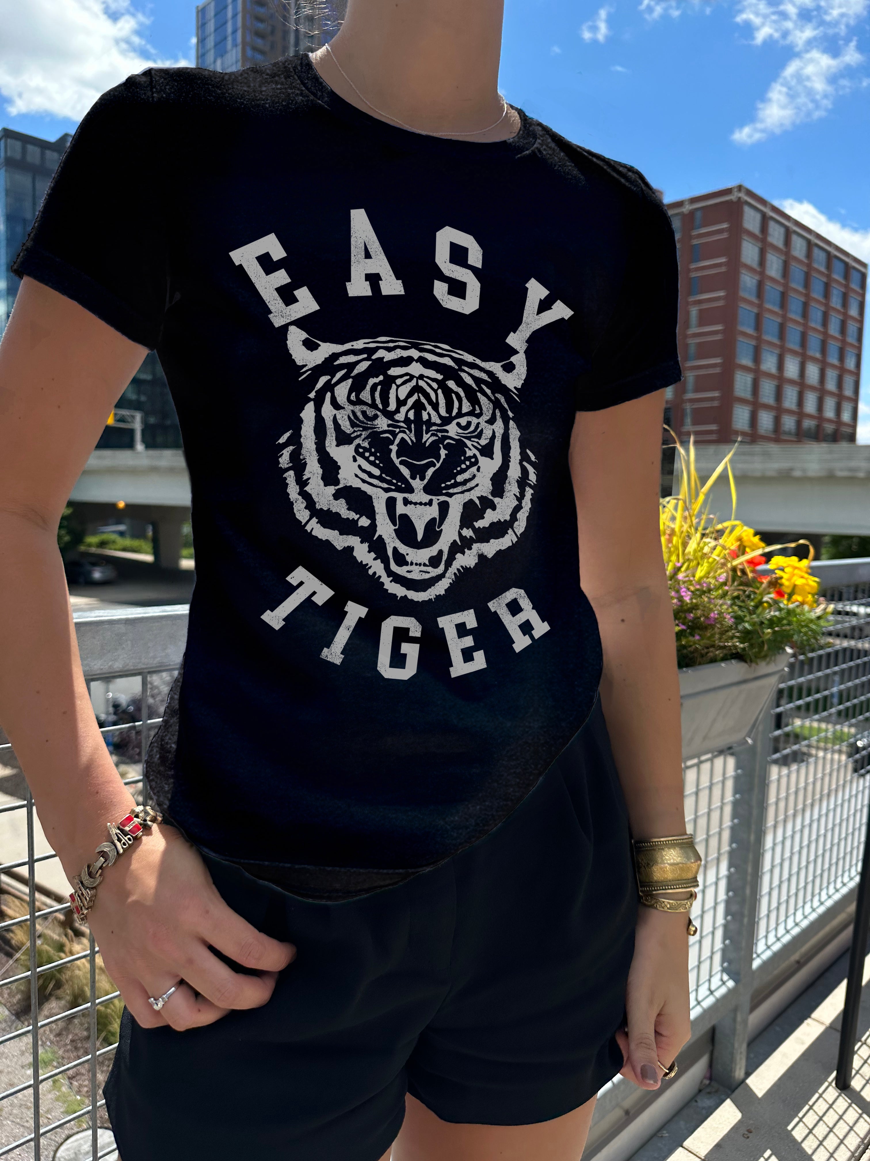 Easy tiger black tee in gray font with a tiger