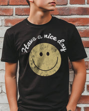 Black mens tshirt that says "Have a nice day" with a smiling face