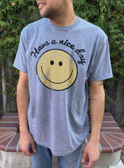 Grey mens tshirt that says "Have a nice day" with a smiling face