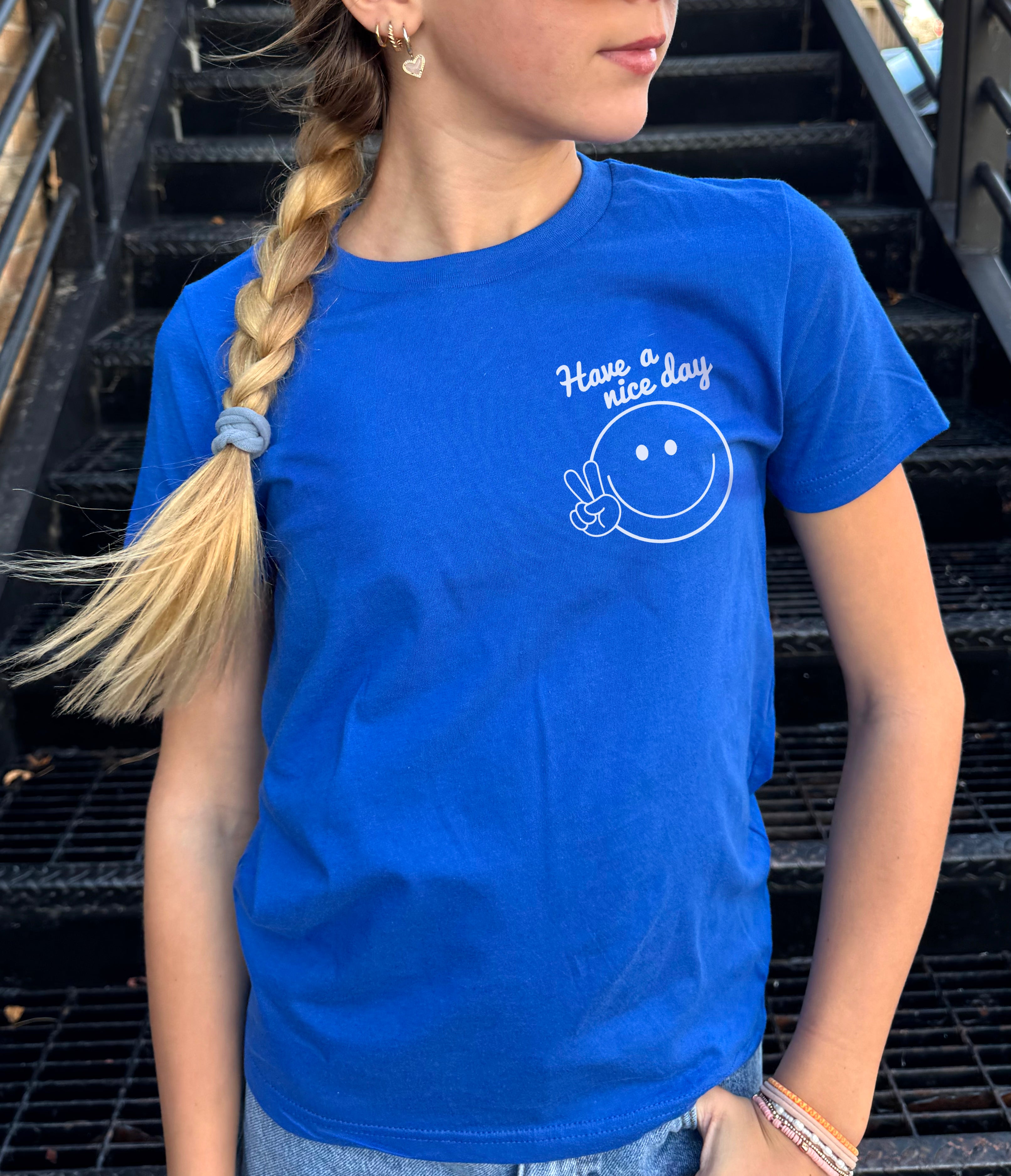 HAVE_A_NICE_DAY_SMILEY_TEE-_BLUE_FRONT.jpg