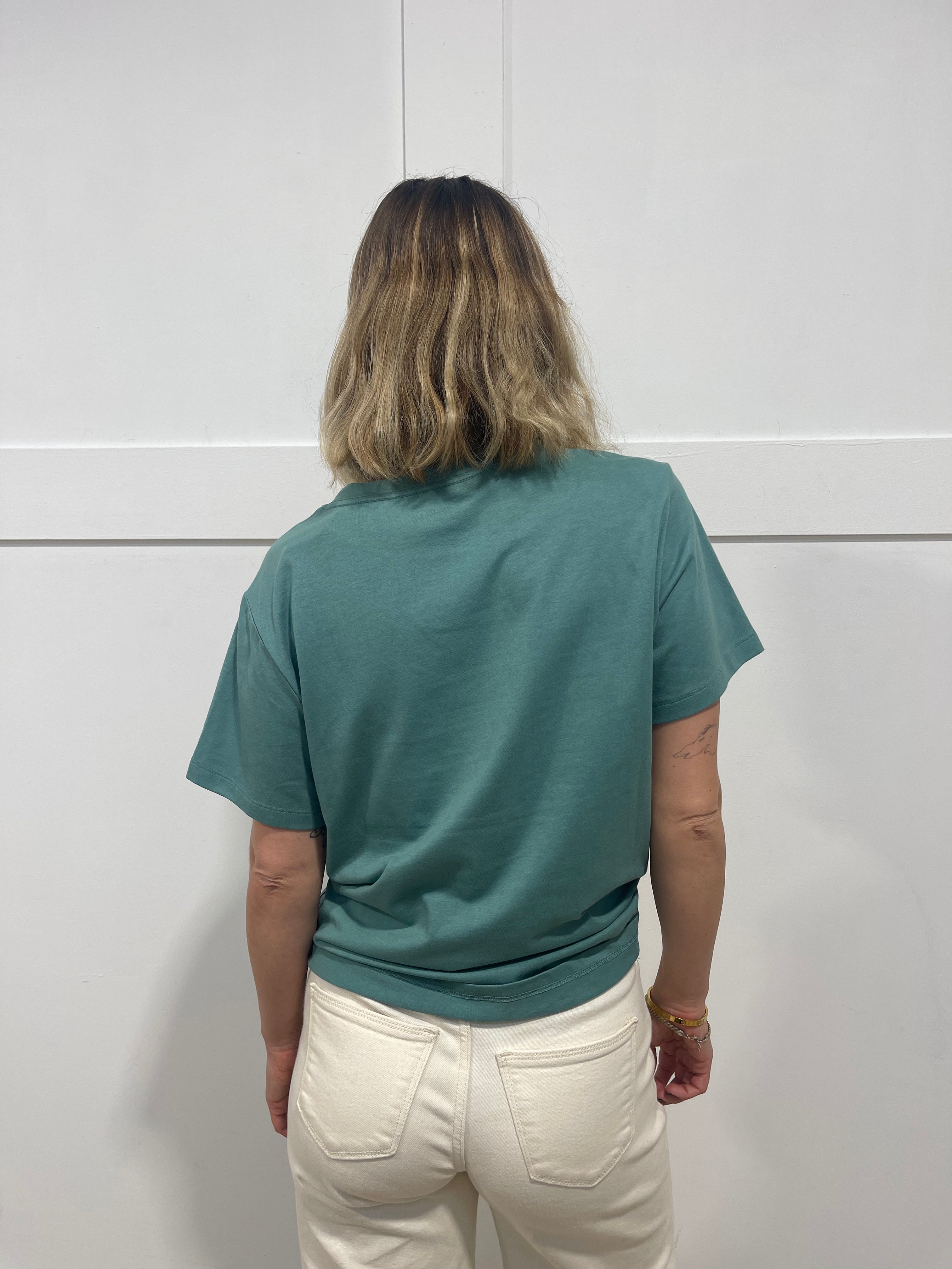 Woman in seafoam t shirt