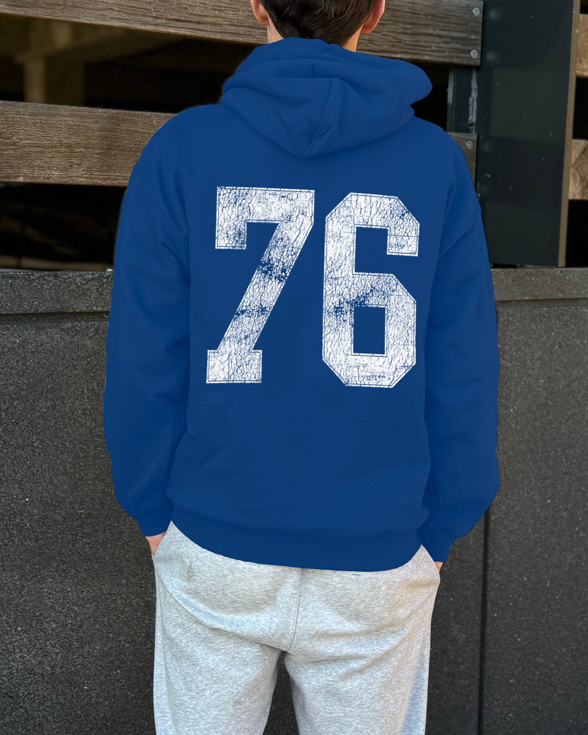 Royal blue hoodie that says "76" in white text