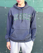 Dark heather hoodie that says "los angeles" in green text