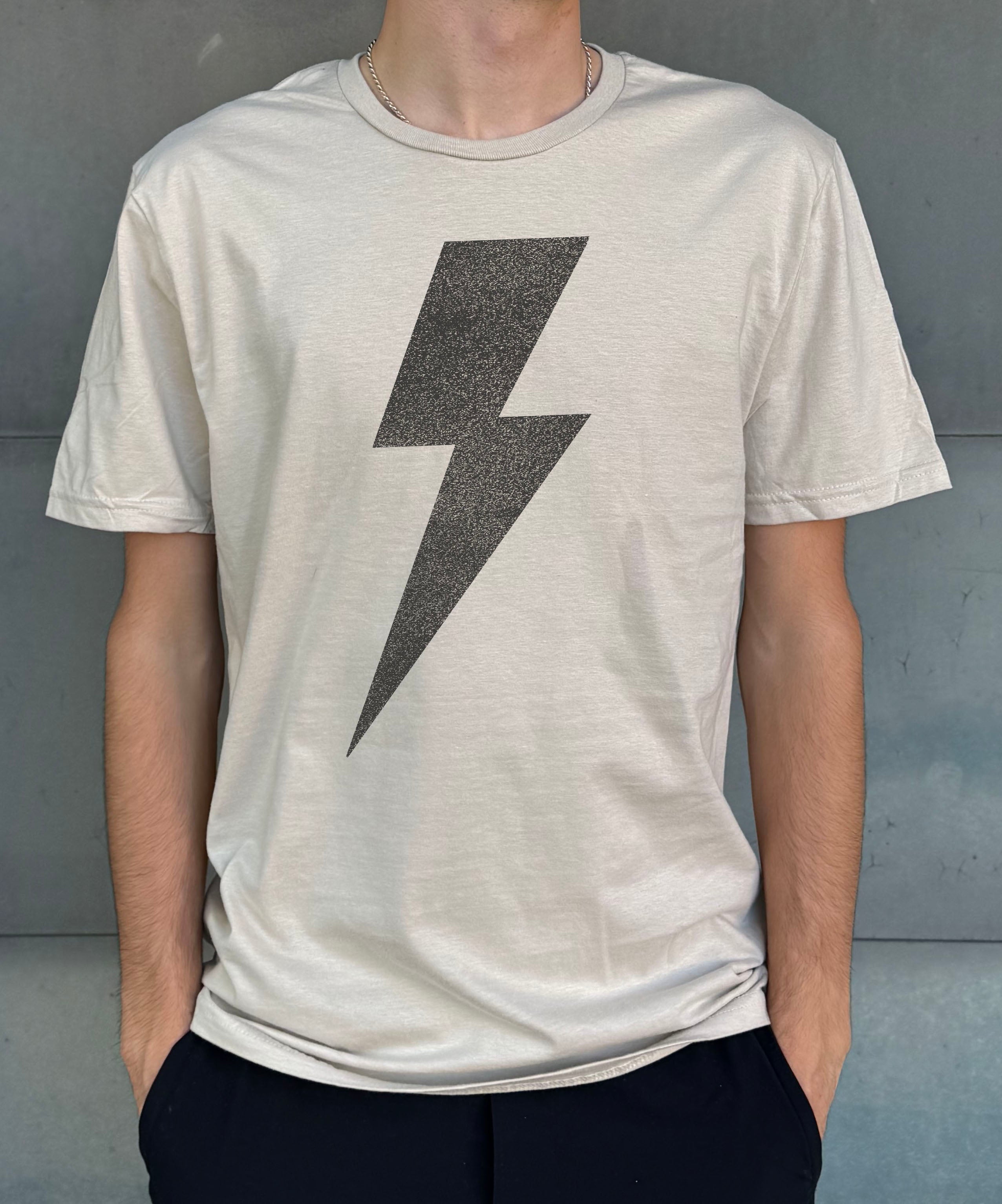 men's t-shirt in sand with grey lightning bolt symbol