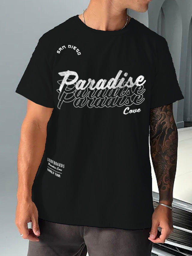 Boys shirt in black that says "Paradise Cove" in white lettering