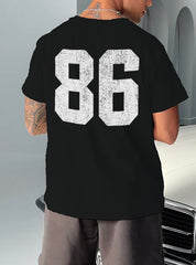 black tshirt that has "86" in whit text on it 