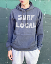 Dark heather hoodie that says "Surf Lcoal" in white text