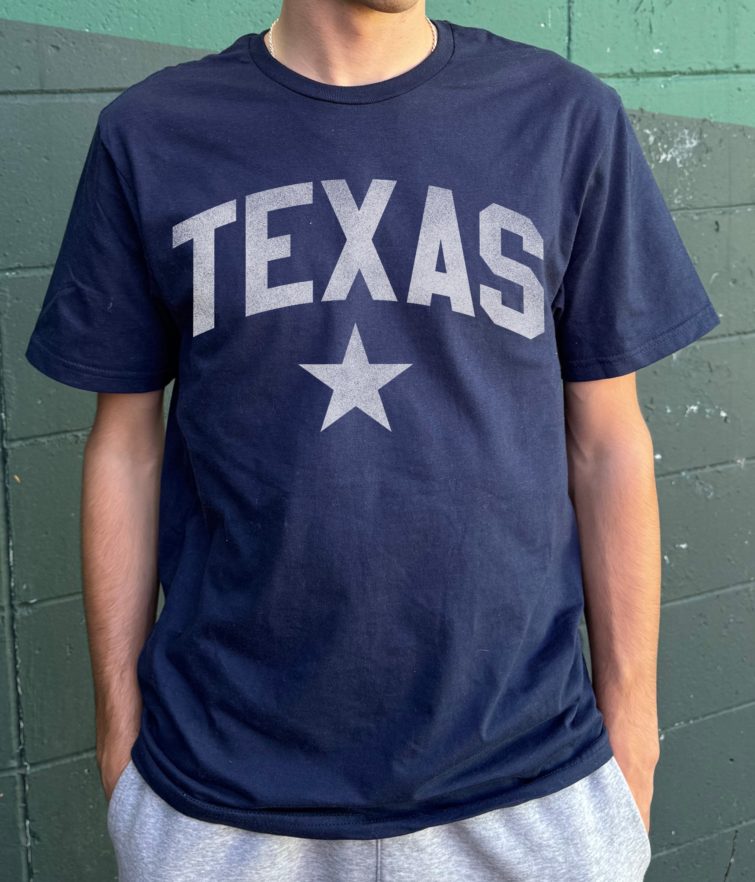Navy T-shirt for men with a Texas lone star logo and "Texas" print in white