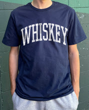 Blue men's t-shirt with "Whiskey" in white font